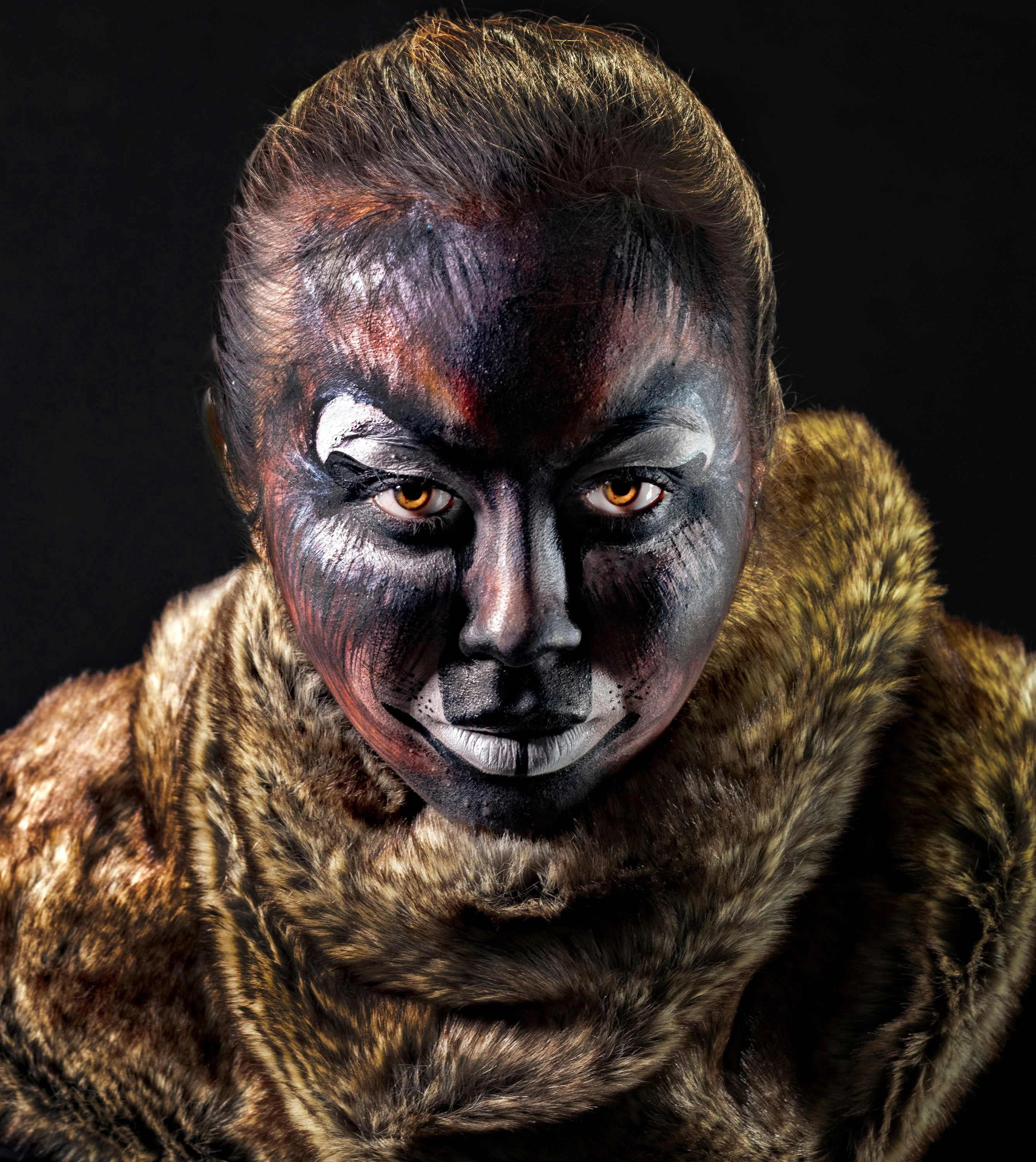 Woman in "fur" collar and wolf makeup