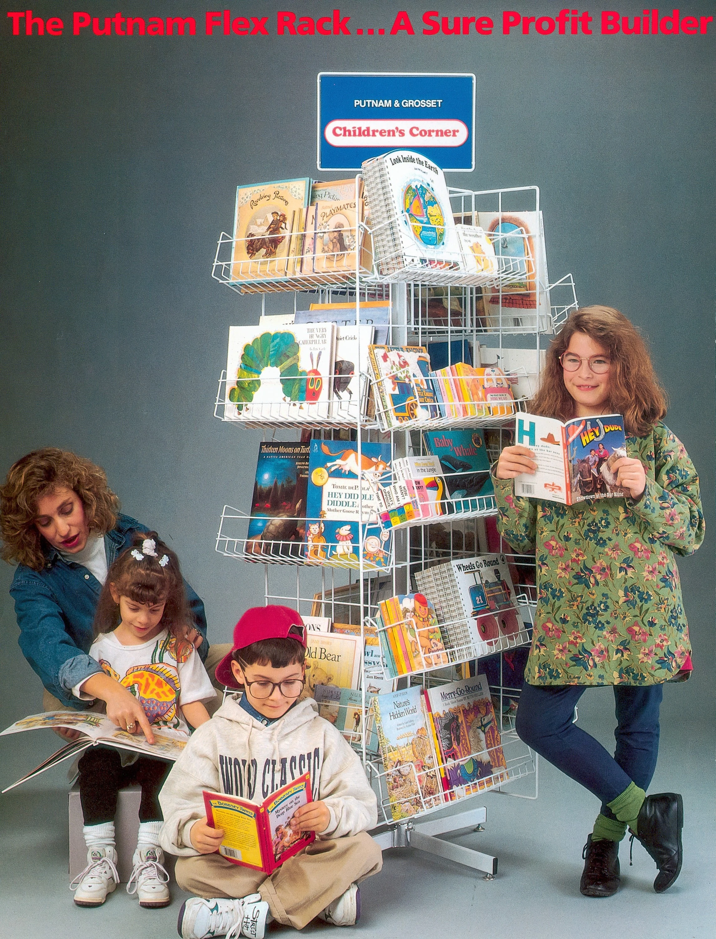 Putnam Book Display surrounded by teach and school children
