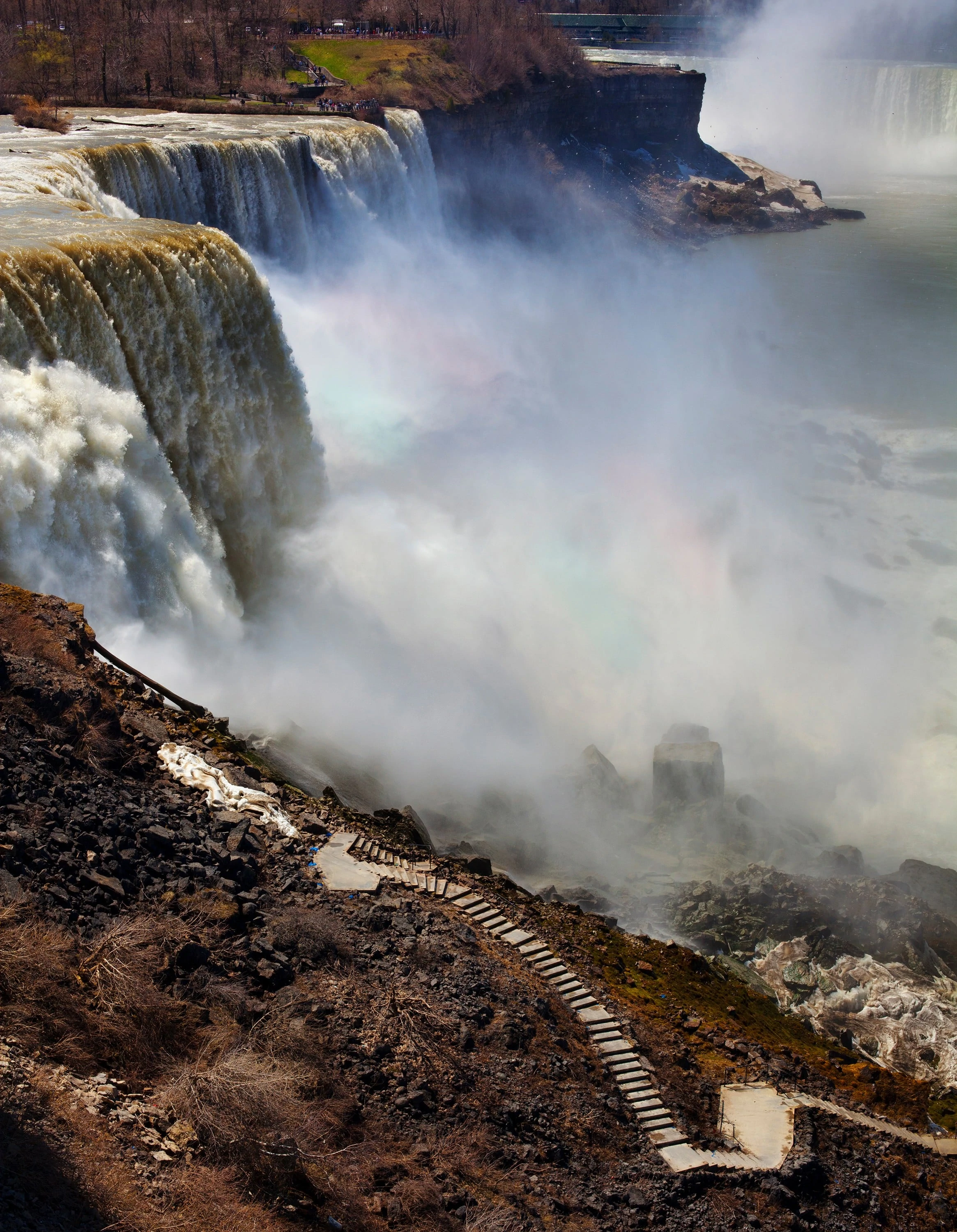 Niagara Falls Footpath leading down to the base of the falls, faint rainbow