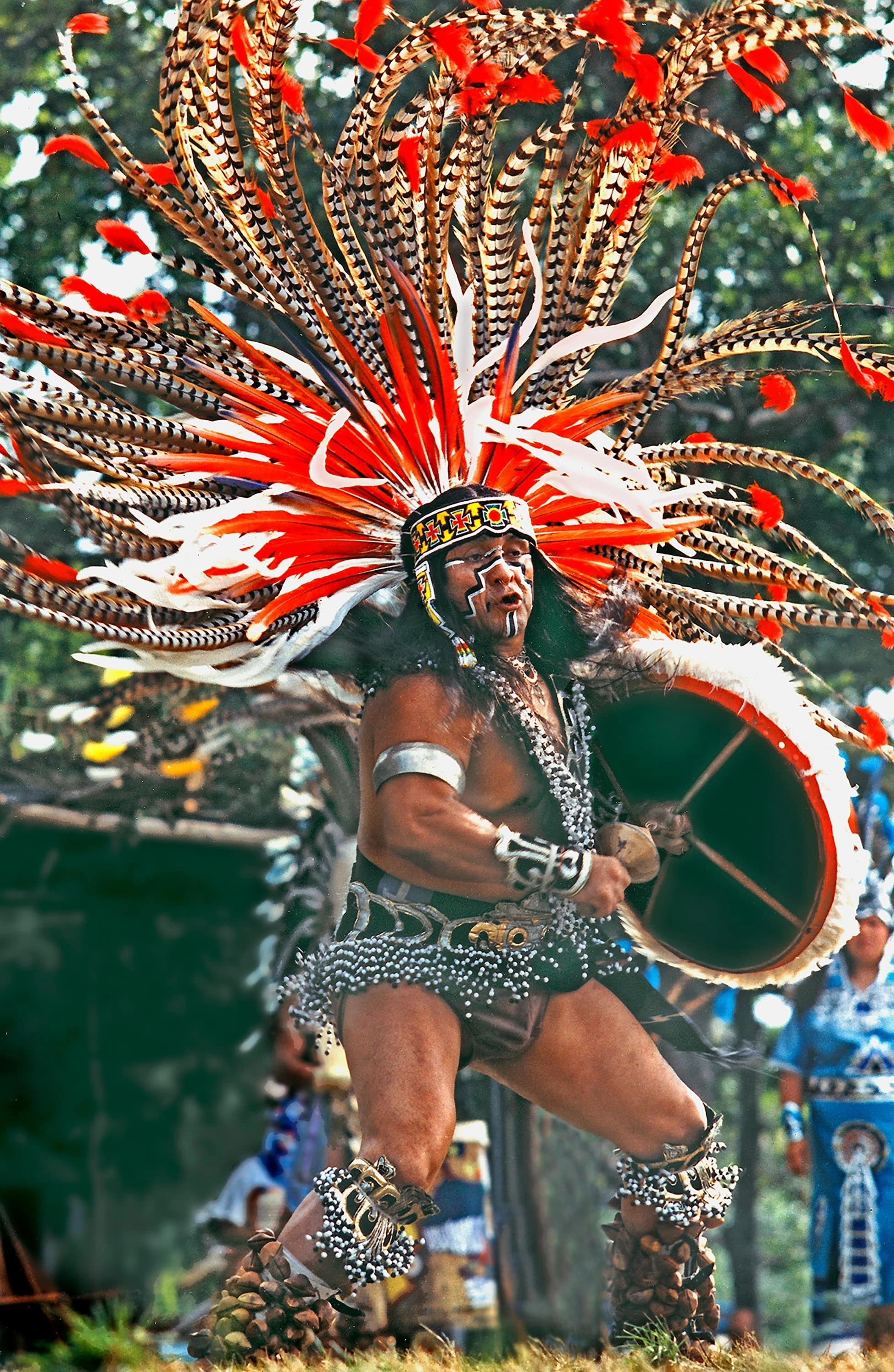 Shinnecock Native American traditional tribal dance full headdress feathers shield