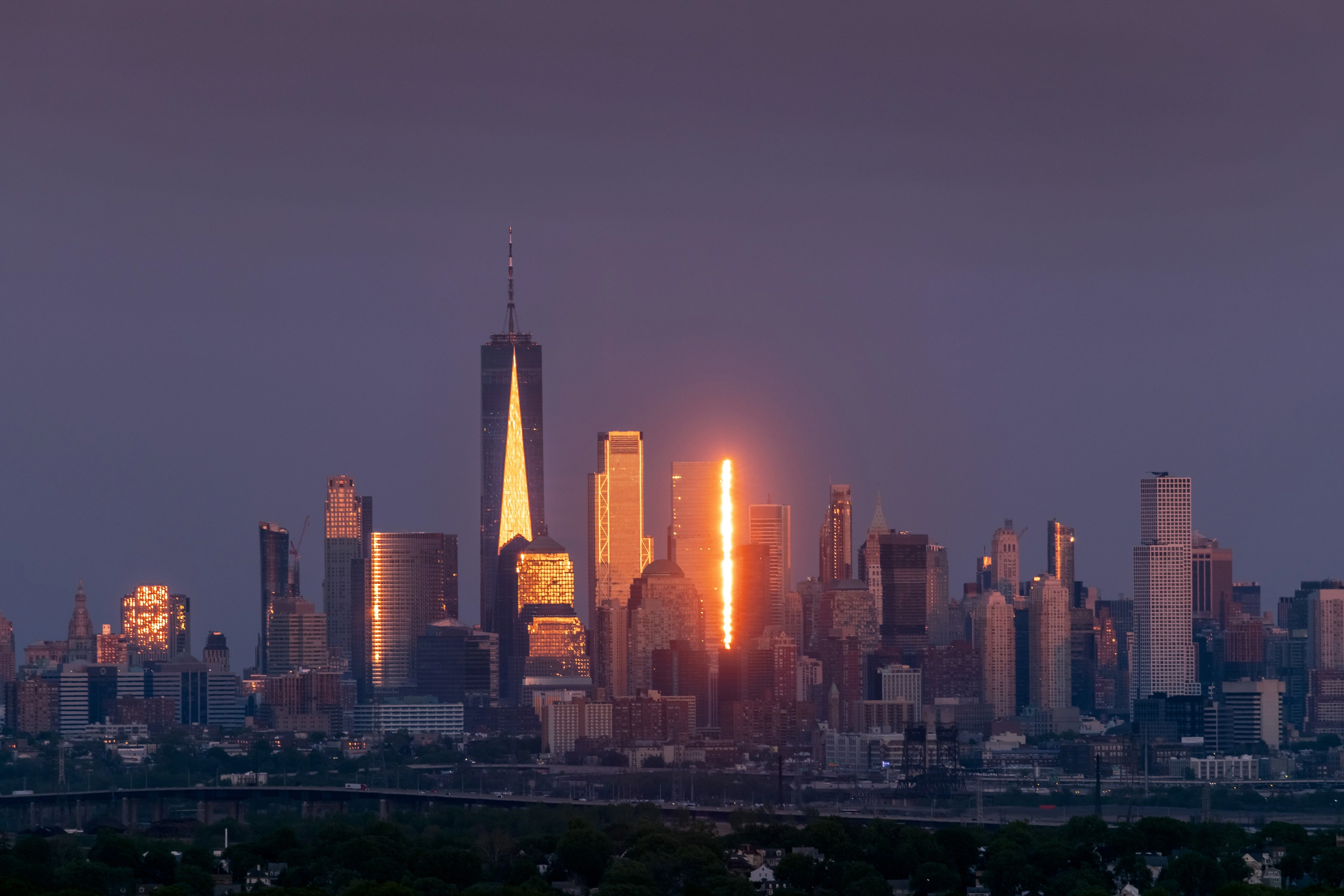 OUT THE WINDOW: intense reflections sunset view of NYC and Jersey City Skyline from Montclair NJ